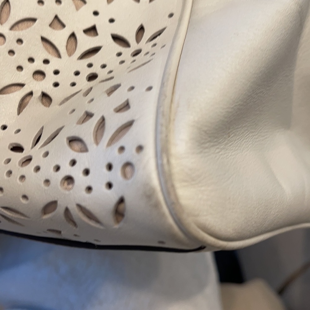 Coach Taylor Perforated Putty White Leather Satchel
12"L x 4.5"W x 8"H - Picture 9 of 11